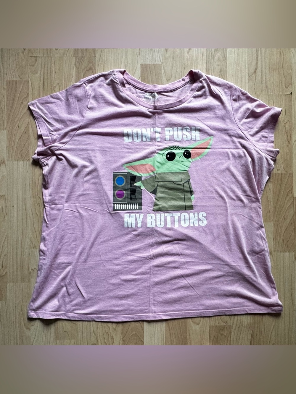 Women’s  Cute Pink Grogu Graphic Tee - “Don’t Push My Buttons”.